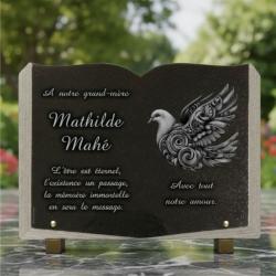 Plaque funéraire livre ouvert en granit avec colombe gravée