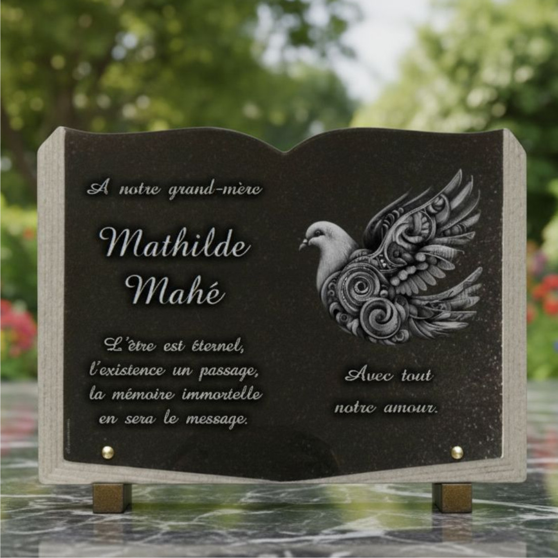 Plaque funéraire livre ouvert en granit avec colombe gravée