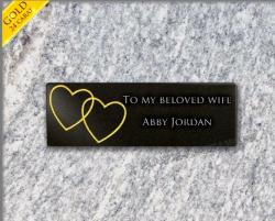 Small adhesive granite grave plaque. Gilt of 2 hearts.