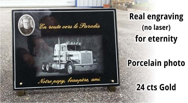Customizable funeral plaque with truck engraved in granite surface.